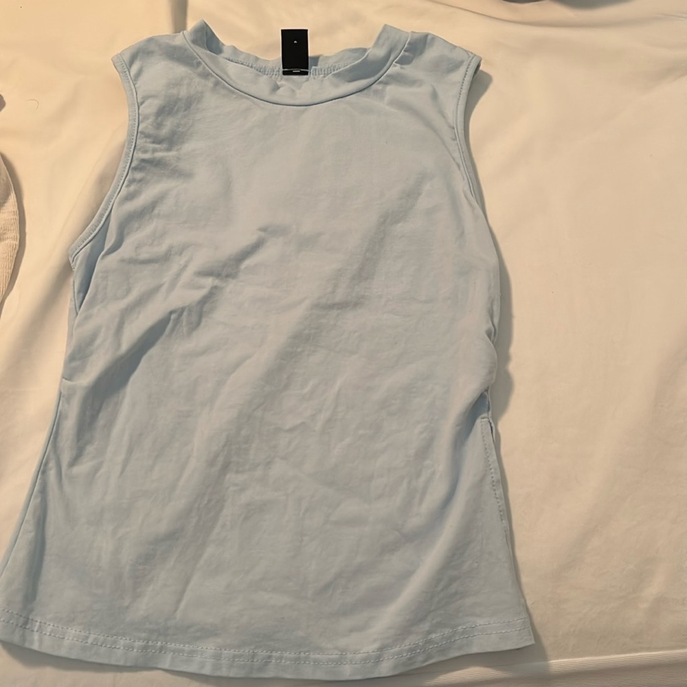 Light blue sleeveless top